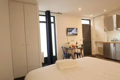Un ou plusieurs lits dans un hébergement de l'établissement MyKeypers - Cozy Studio near Canal Saint Martin