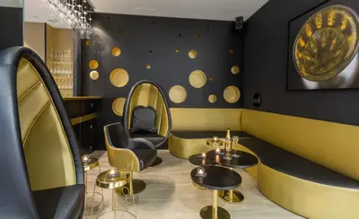 Coin salon dans l'établissement Hotel Les Bulles De Paris