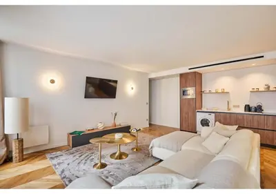 Télévision ou salle de divertissement dans l'établissement Sublim AC Apartment Opéra Madeleine