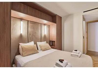 Un ou plusieurs lits dans un hébergement de l'établissement Sublim AC Apartment Opéra Madeleine