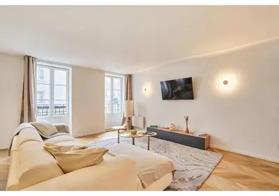 Télévision ou salle de divertissement dans l'établissement Sublim AC Apartment Opéra Madeleine