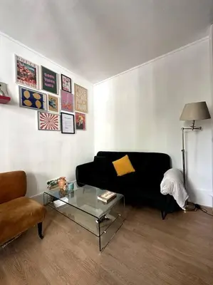 Coin salon dans l'établissement Appartement parisien