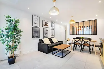 Coin salon dans l'établissement Super appartement 2BR 6P Bastille