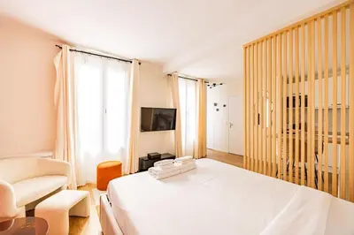 Un ou plusieurs lits dans un hébergement de l'établissement 11#Studio 2 pers#Bon Marché#St Germain#Paris 6
