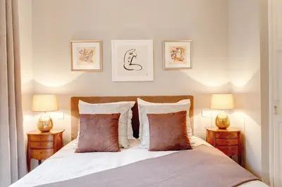 Un ou plusieurs lits dans un hébergement de l'établissement Blanc Manteau Residence