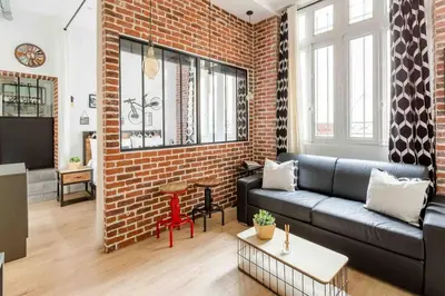 Coin salon dans l'établissement M2- Modern Loft in Le Marais, Bright and Comfortable