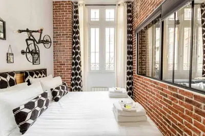 Un ou plusieurs lits dans un hébergement de l'établissement M2- Modern Loft in Le Marais, Bright and Comfortable