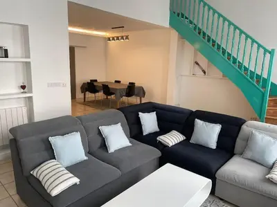 Coin salon dans l'établissement Magnifique appartement