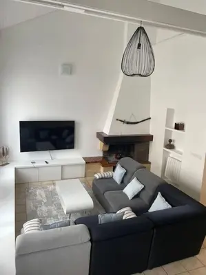 Coin salon dans l'établissement Magnifique appartement