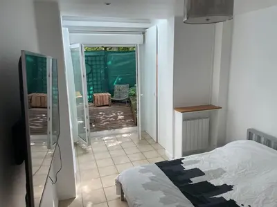 Un ou plusieurs lits dans un hébergement de l'établissement Magnifique appartement