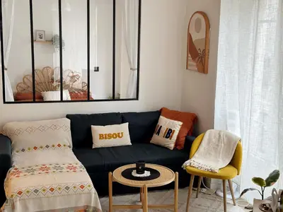 Coin salon dans l'établissement Appartement Calme et Cozy en plein Paris