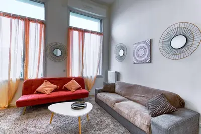 Coin salon dans l'établissement Pablo Picasso - Appt à 30min de Montmartre