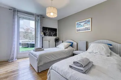 Un ou plusieurs lits dans un hébergement de l'établissement La Plume d'Hugo - Appt Duplex pour 8