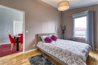 Un ou plusieurs lits dans un hébergement de l'établissement La Plume d'Hugo - Appt Duplex pour 8