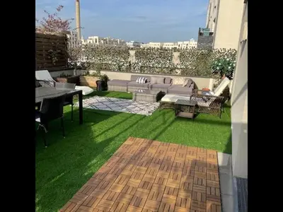 Coin salon dans l'établissement La Plume d'Hugo - Appt Duplex pour 8
