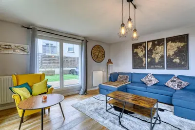 Coin salon dans l'établissement La Plume d'Hugo - Appt Duplex pour 8