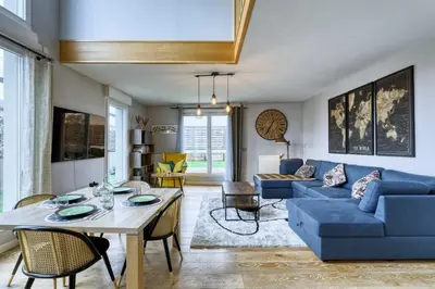 Coin salon dans l'établissement La Plume d'Hugo - Appt Duplex pour 8