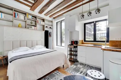 Un ou plusieurs lits dans un hébergement de l'établissement Classy studio - Marais Bastille
