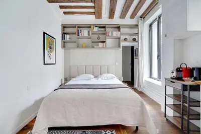 Un ou plusieurs lits dans un hébergement de l'établissement Classy studio - Marais Bastille