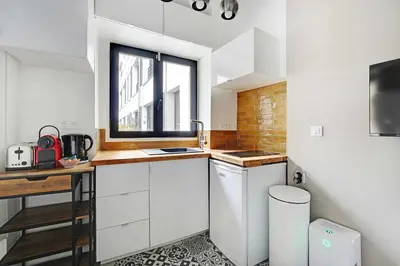 Cuisine ou kitchenette dans l'établissement Classy studio - Marais Bastille