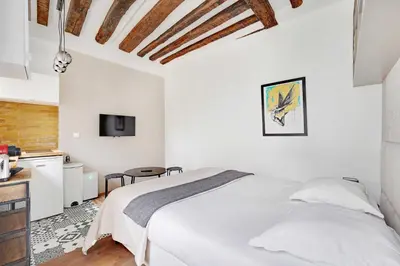 Un ou plusieurs lits dans un hébergement de l'établissement Classy studio - Marais Bastille