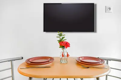 Télévision ou salle de divertissement dans l'établissement La Felicita - Studio avec Balcon Paris - Netflix