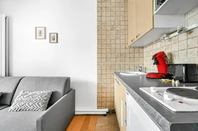 Cuisine ou kitchenette dans l'établissement La Felicita - Studio avec Balcon Paris - Netflix