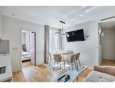 Télévision ou salle de divertissement dans l'établissement Residence apartment Bastille - Le Marais