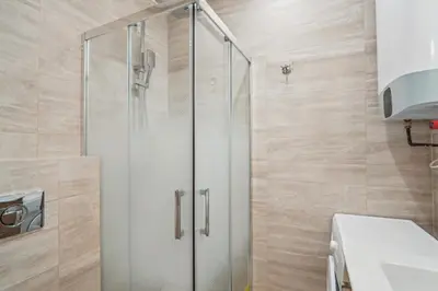 Salle de bains dans l'établissement Appartement Elegant 1BDR-2P - Paris Expo