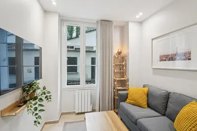Coin salon dans l'établissement Appartement Elegant 1BDR-2P - Paris Expo