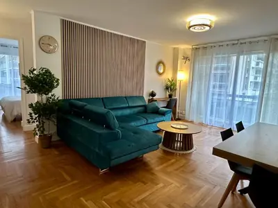 Coin salon dans l'établissement Appartement 5 personnes Léon Frot PARIS