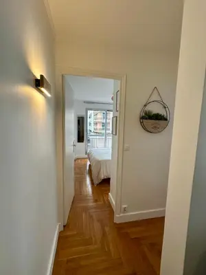 Télévision ou salle de divertissement dans l'établissement Appartement 5 personnes Léon Frot PARIS