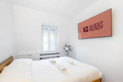 Un ou plusieurs lits dans un hébergement de l'établissement GuestReady - Paris Escape with Eiffel Views