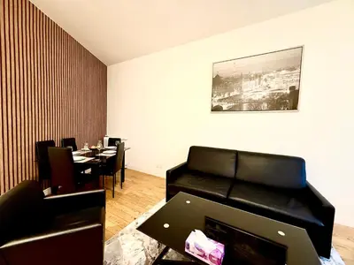 Coin salon dans l'établissement Family Champs Elysées appartement