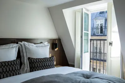 Un ou plusieurs lits dans un hébergement de l'établissement Hôtel La Tamise - Esprit de France