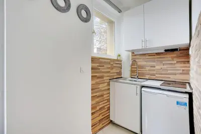 Cuisine ou kitchenette dans l'établissement Appartement Suite 12 aux Portes de Paris