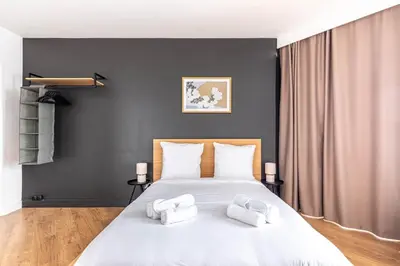 Un ou plusieurs lits dans un hébergement de l'établissement GuestReady - Black pearl close to the metro