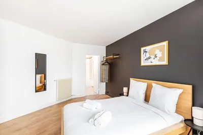 Un ou plusieurs lits dans un hébergement de l'établissement GuestReady - Black pearl close to the metro
