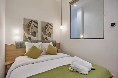 Un ou plusieurs lits dans un hébergement de l'établissement Apartment on the Champs Elysees