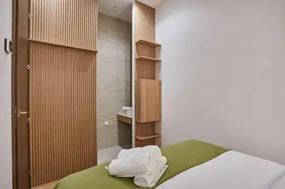 Un ou plusieurs lits dans un hébergement de l'établissement Apartment on the Champs Elysees