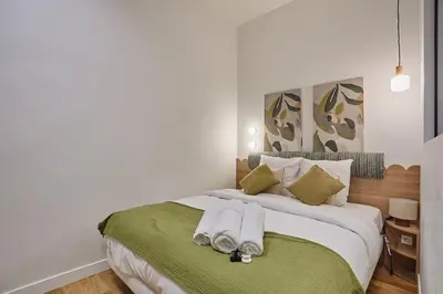 Un ou plusieurs lits dans un hébergement de l'établissement Apartment on the Champs Elysees