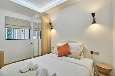 Un ou plusieurs lits dans un hébergement de l'établissement Charming flat Jardin du Luxembourg Montparnasse