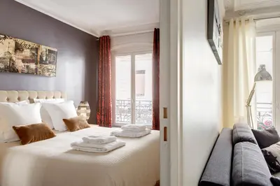 Un ou plusieurs lits dans un hébergement de l'établissement Beauregard Design residence
