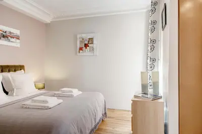 Un ou plusieurs lits dans un hébergement de l'établissement Beauregard Design residence