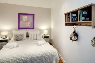 Un ou plusieurs lits dans un hébergement de l'établissement Beauregard central residence
