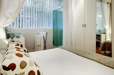 Un ou plusieurs lits dans un hébergement de l'établissement Beauregard central residence