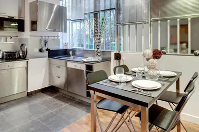 Cuisine ou kitchenette dans l'établissement Beauregard central residence