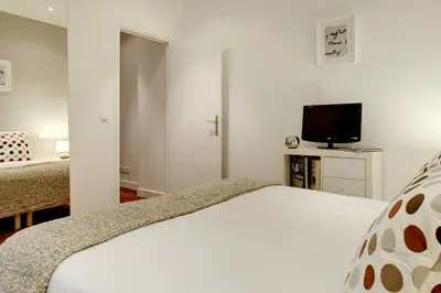 Un ou plusieurs lits dans un hébergement de l'établissement Beauregard central residence