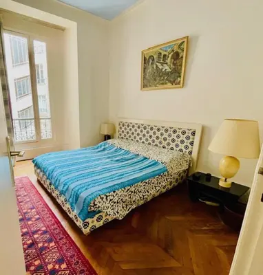 Un ou plusieurs lits dans un hébergement de l'établissement appartement pres de la tour eiffel