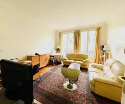 Coin salon dans l'établissement appartement pres de la tour eiffel